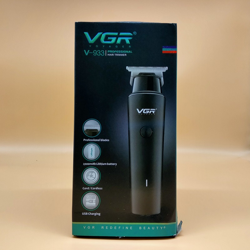 ماشین اصلاح موی سر و صورت وی جی ار مدل V-933 با تیغه استیل پیشرفته، اصلاح خط زن و حجم زن، قابلیت استفاده خشک و مرطوب، باتری قابل شارژ با 500 دقیقه کارکرد و چهار شانه تنظیم اندازه اصلاح 0.5 تا 2 میلیمتر